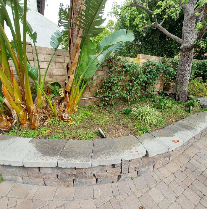 Commercial groundskeeping team maintaining large manicured lawn in Rancho Palos Verdes.