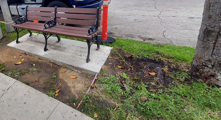 commercial space with bench before landscaping service